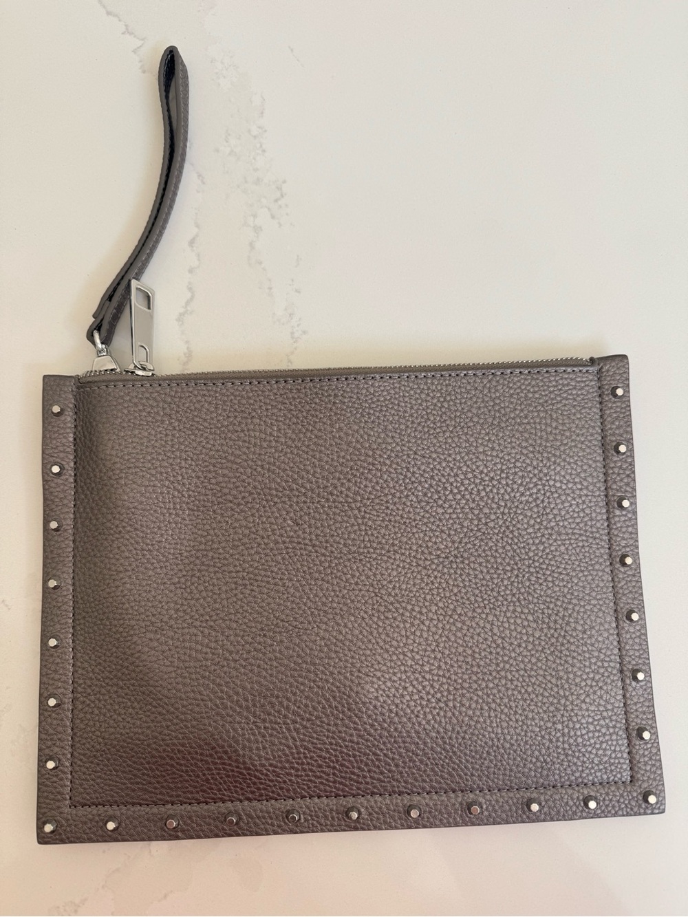 White House Black Market Pebbled Wristlet with silver accents
